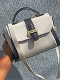 Bolsa Mk com alça tiracolo