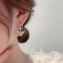 Brincos de borboleta com strass