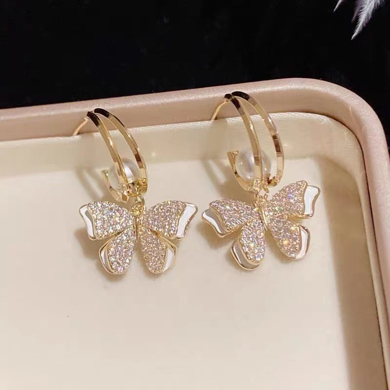 Brincos de borboleta com strass